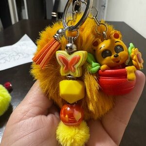 Winnie the Pooh in full bloom Doorables keychain